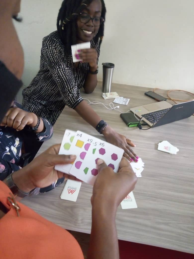 Adults playing Matica